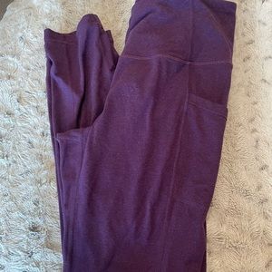 Purple Zyia leggings with pockets. 7/8 length